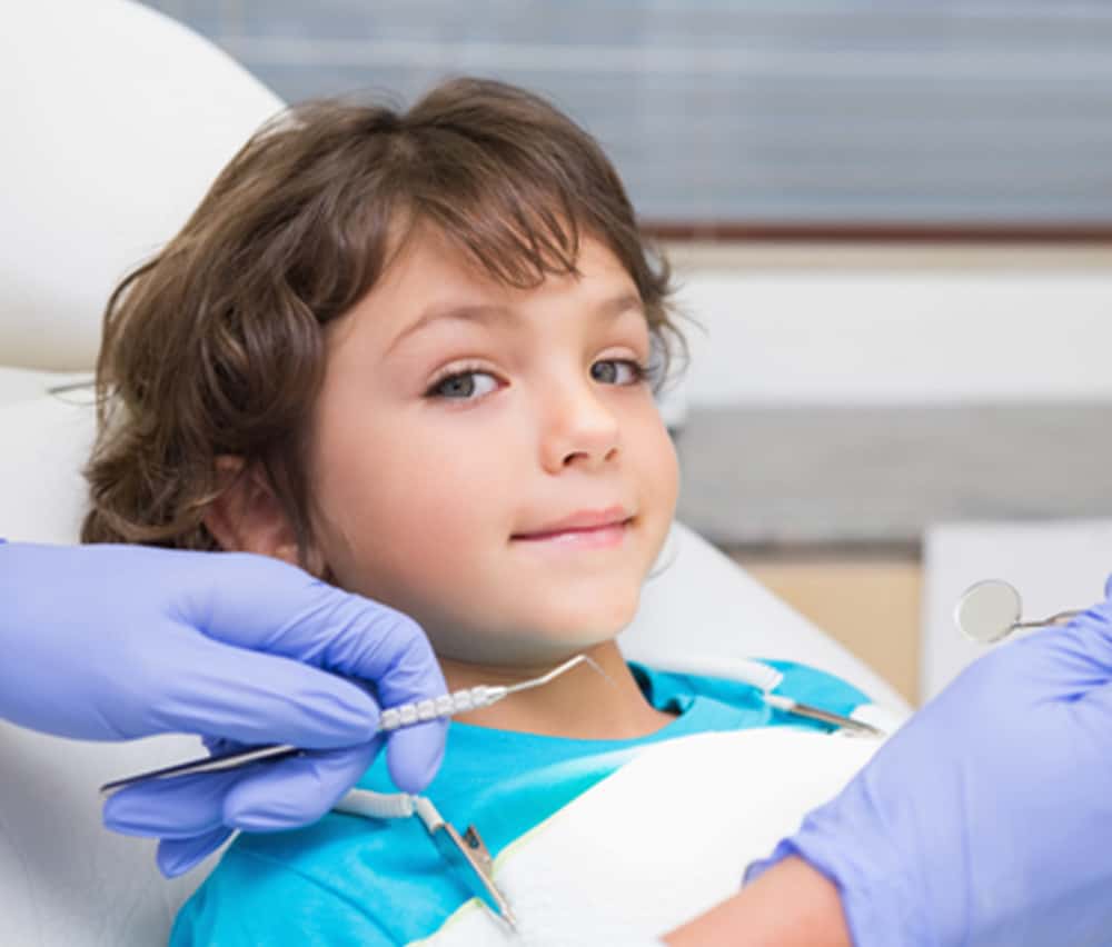 child first cleaning & dental check up near you